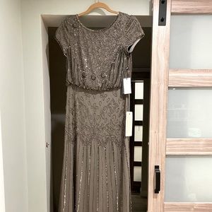 Adrianna Papell Short Sleeve Blouson Beaded Gown In Lead
Color: Lead